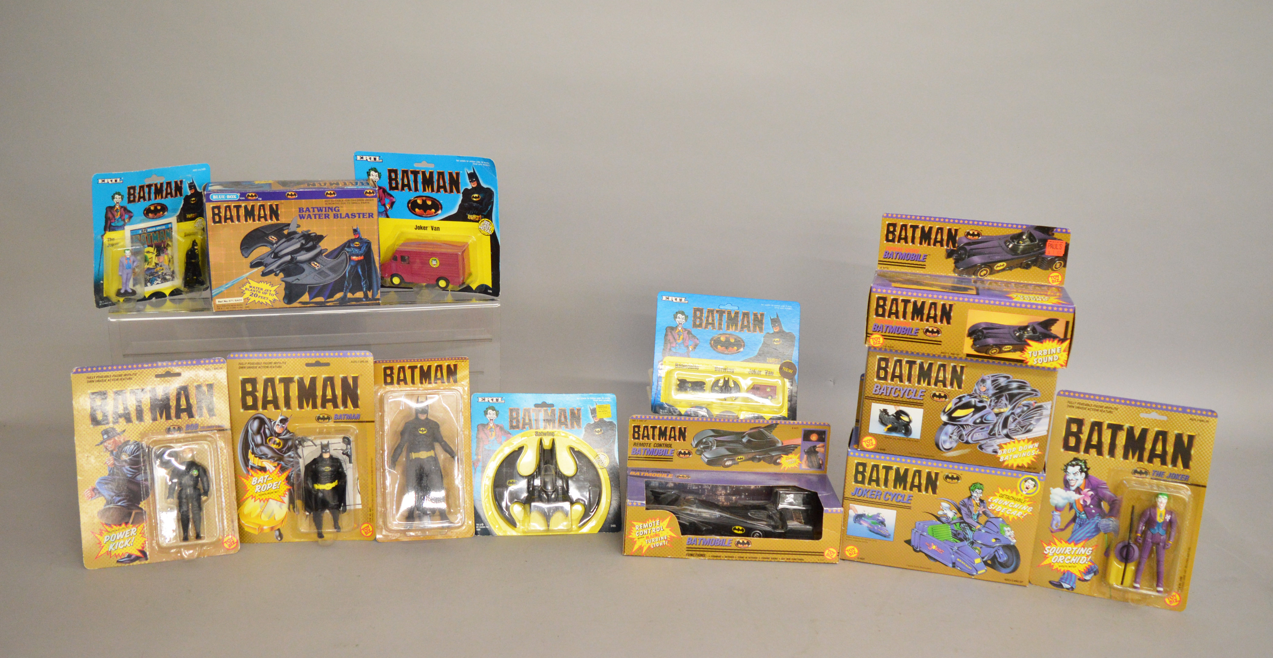 Thirteen Batman figures and vehicles by Toy Biz,