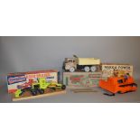 Three boxed Marx Pressed Steel Toys, a 'Powerhouse Scissor Action Hydraulic Dump Truck',