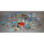 A collection of Lego sets which come with instructions,