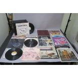 Collection of LP vinyl records in record box including Caravan In the Land of Grey and Pink SDL R1