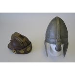 Two movie prop helmets - one Norse style helmet with cheek guards,