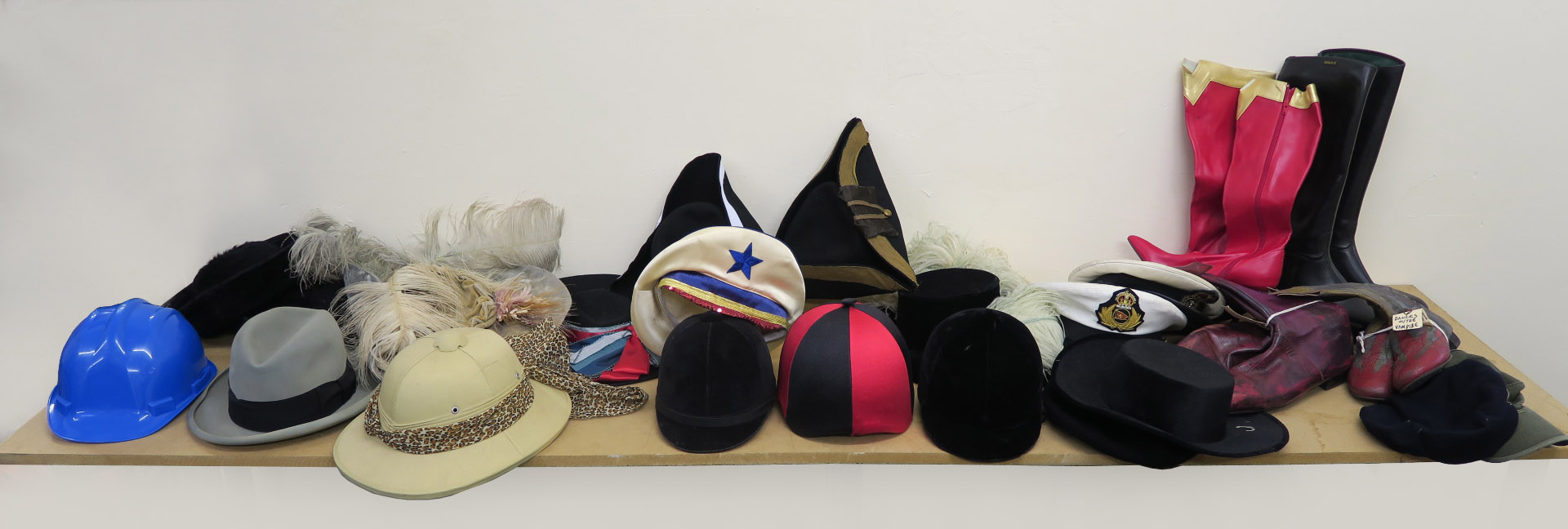 Collection of hats and boots many from the Western Costume Company of Hollywood California