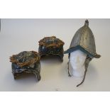 Three movie prop helmets - one Spanish Armada style with ear protector chin strap plus two metal