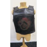 "Dracula Untold" black leather cuirass with inlaid Chinese red dragon motif to front,