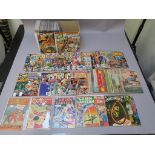 Large collection of comic books in one long box titles include; Marvel Family #23 & 24,