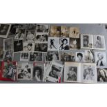Collection of five folders full of cinema stills mostly measuring 10 x 8 inch,
