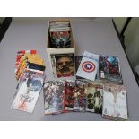 Over 150 comics in a comic box some Marvel including Venom,