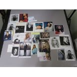 A collection of signed photos most of which appear genuine but may contain facsimile also - Brian