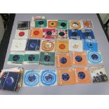 A collection of 7 inch singles most with sleeves and in good condition,