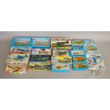 Twenty five aircraft model kits by Novo and Monogram,