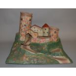 EX-SHOP STOCK: A railway diorama or a hill-top castle with drawbridge, possibly by Triang,