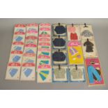 EX-SHOP STOCK: Twenty nine outfit sets for Sindy and Paul dolls which are all by Pedigree,