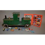 A large vintage wooden 'Pull-Along' Model Train on metal wheels with rubber tyres,