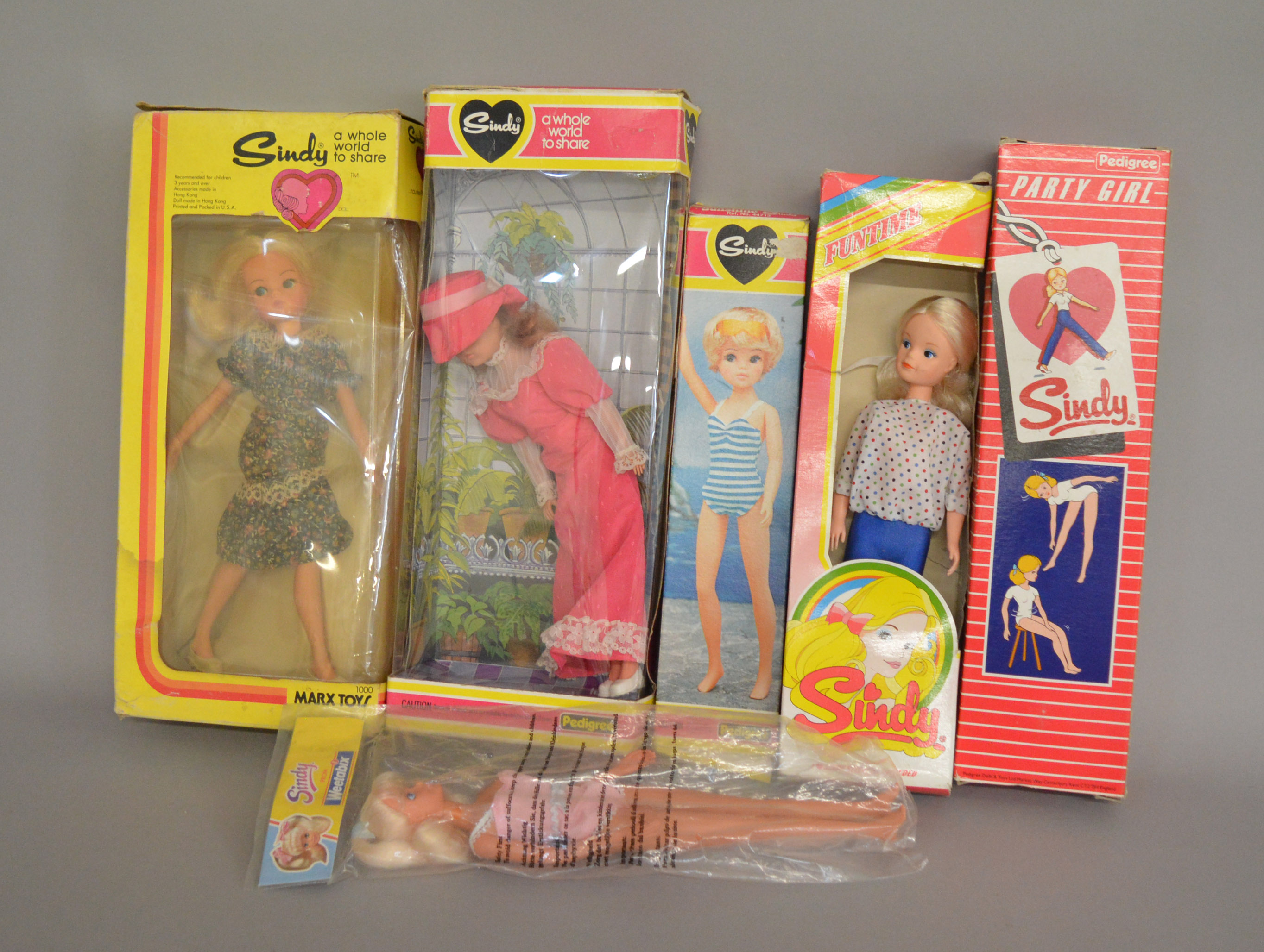 EX-SHOP STOCK: Five Pedigree Sindy Fashion Dolls together with a Marx Toys example,