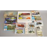 A selection of twelve model kits by various manufacturers,