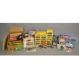 A mixed lot containing a quantity of boxed and carded diecast models by Corgi,