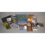 A collection of Lord of The Rings items, which includes; Collectors edition art portfolio,