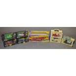 A group of nine boxed diecast models, including a Matchbox King Size K-11 DAF Car Transporter,