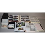 Four large photograph albums and five plastic photo storage boxes containing a large quantity of