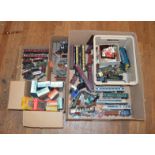 EX-SHOP STOCK: A large mixed lot of trains and accessories, this includes, coaches, engines,