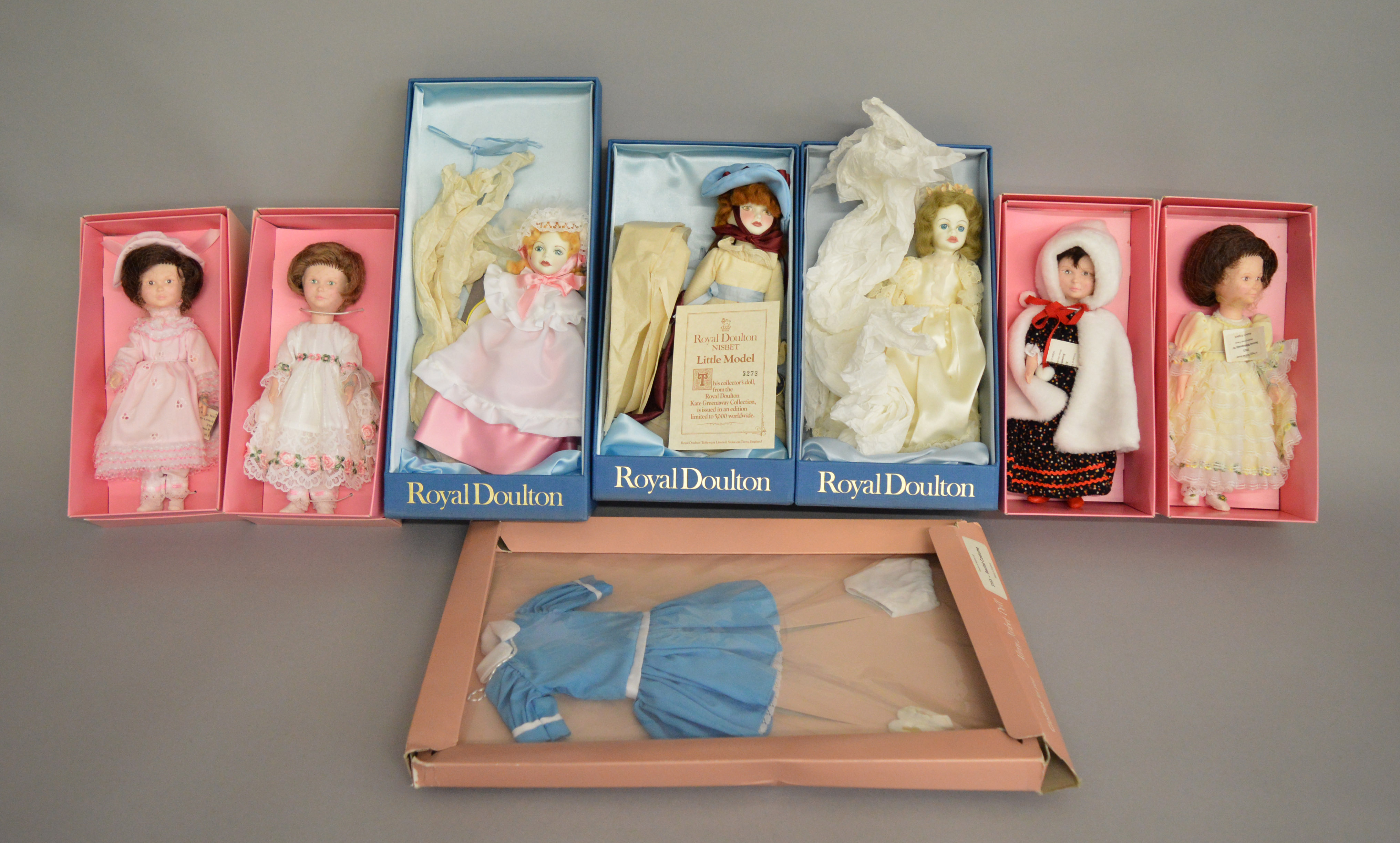 EX-SHOP STOCK: Seven House of Nisbett dolls including 3 by Royal Doulton, all boxed.