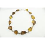 A silver amber set necklet,