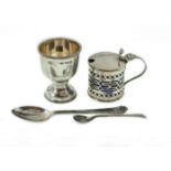 A cased silver egg cup & spoosilver cruet setn together with a cased part