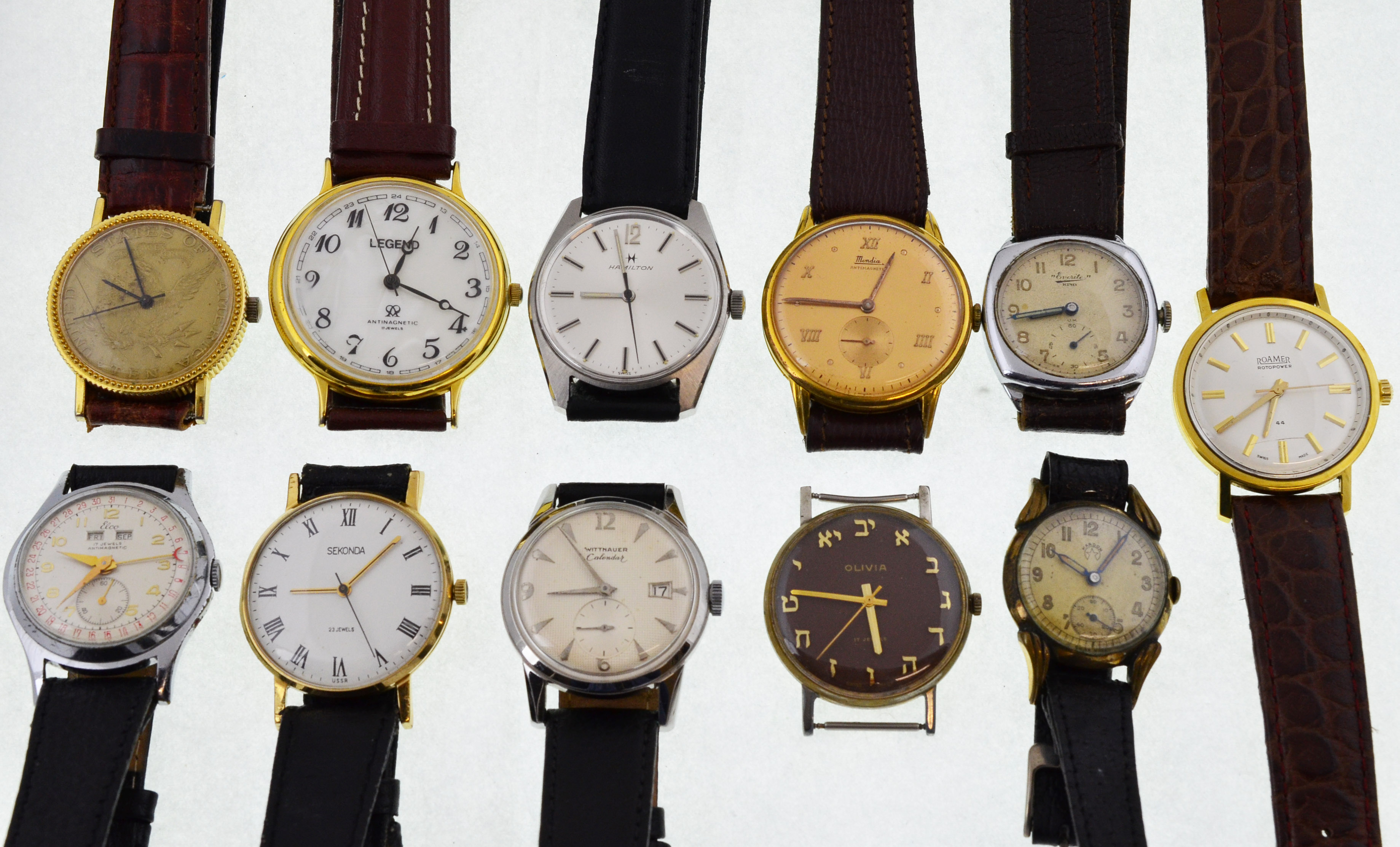 Eleven working mechanical wristwatches to include a 1950's Elco calendar with working appetures