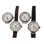 Four early 20th century mechanical silver watches, all with uncracked white enamel dials,