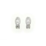 A pair of 18ct H/M modern diamond cuff earrings, baguette,