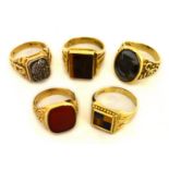 Four gents 9ct H/M rings to include carnelian set etc, approx gross weight 30.
