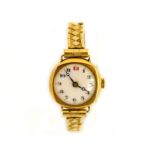 An early 20th century ladies 9ct mechanical wristwatch with an uncracked white enamel dial,