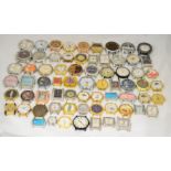 A boxed quantity of approximately 70 quartz watch heads, all without straps, some working.