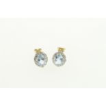 A pair of blue topaz & diamond earrings H/M 9ct, approx total diamond weight 0.