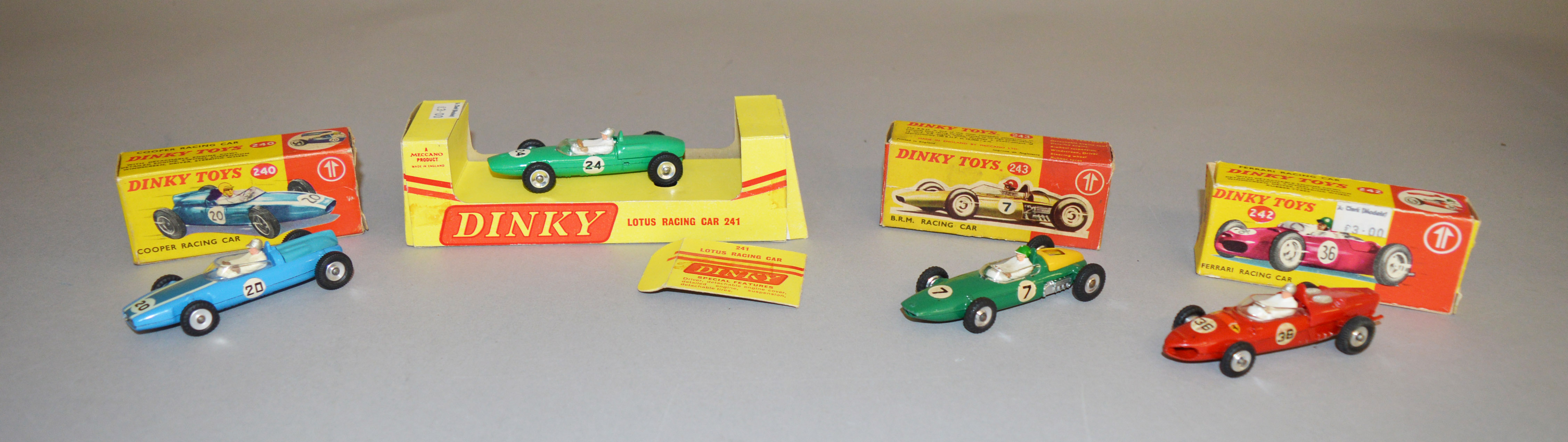 4 boxed Dinky Toys diecast model Racing Cars, 240 Cooper, 242 Ferrari, 243 B.R.M.