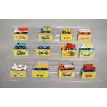 12 boxed Matchbox 1-75 series 'Regular Wheel' diecast models, including 8 Mustang, 47, 49 Unimog,
