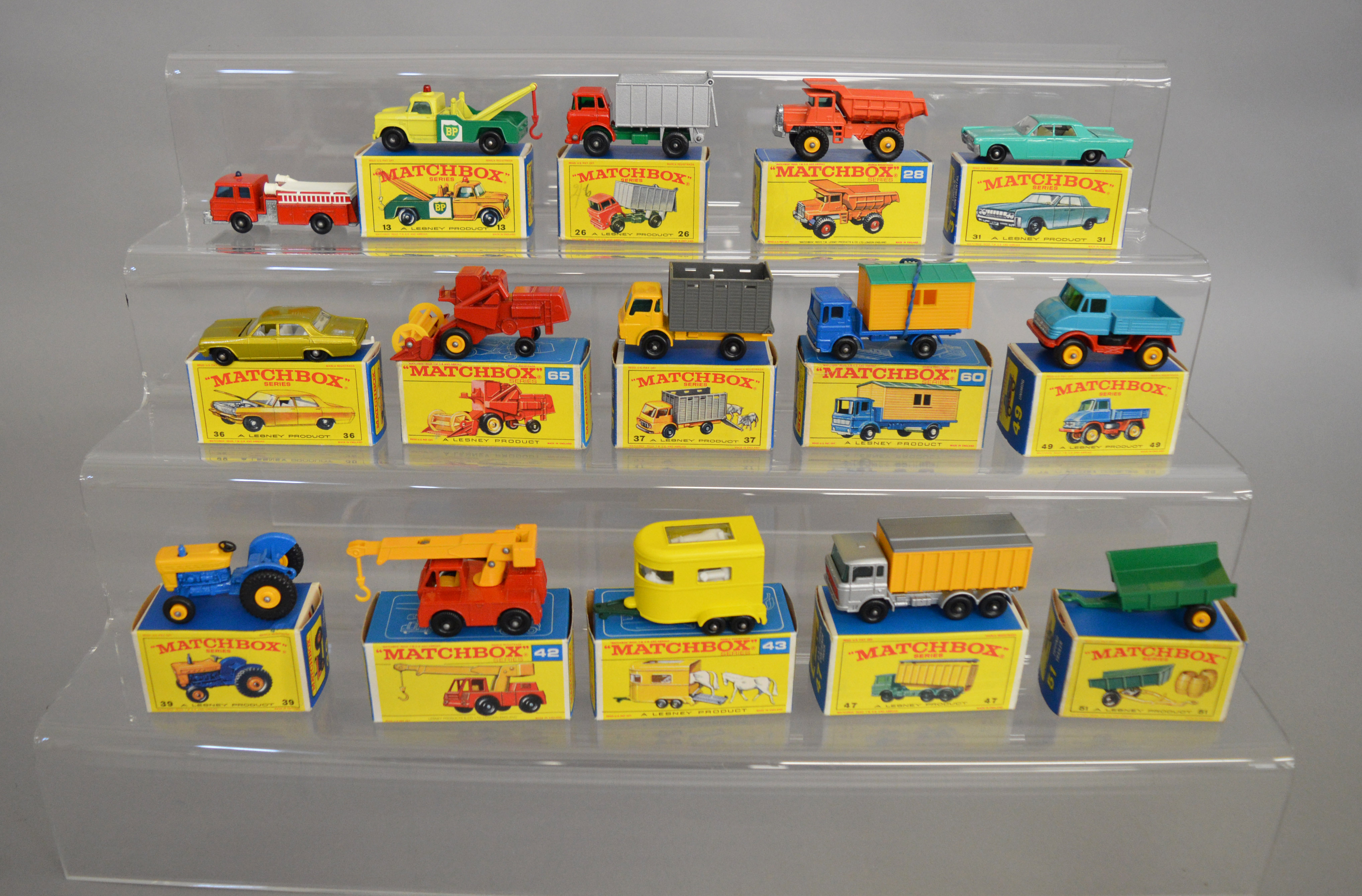 14 boxed Matchbox 1-75 series 'Regular Wheel' diecast models, including 13 Wreck Truck, 26,