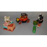 Three unboxed vintage Japanese battery operated tinplate toys including a Vintage car,