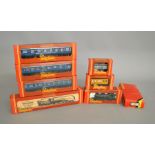 OO Gauge. A quantity of boxed Hornby locomotives, rolling stock and accessories including R.