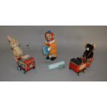 Three unboxed vintage Japanese battery operated tinplate toys including a Yonezawa (Japan) Clown