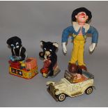 Three unboxed vintage Japanese battery operated tinplate toys including an A1 Toys 'Blacksmith