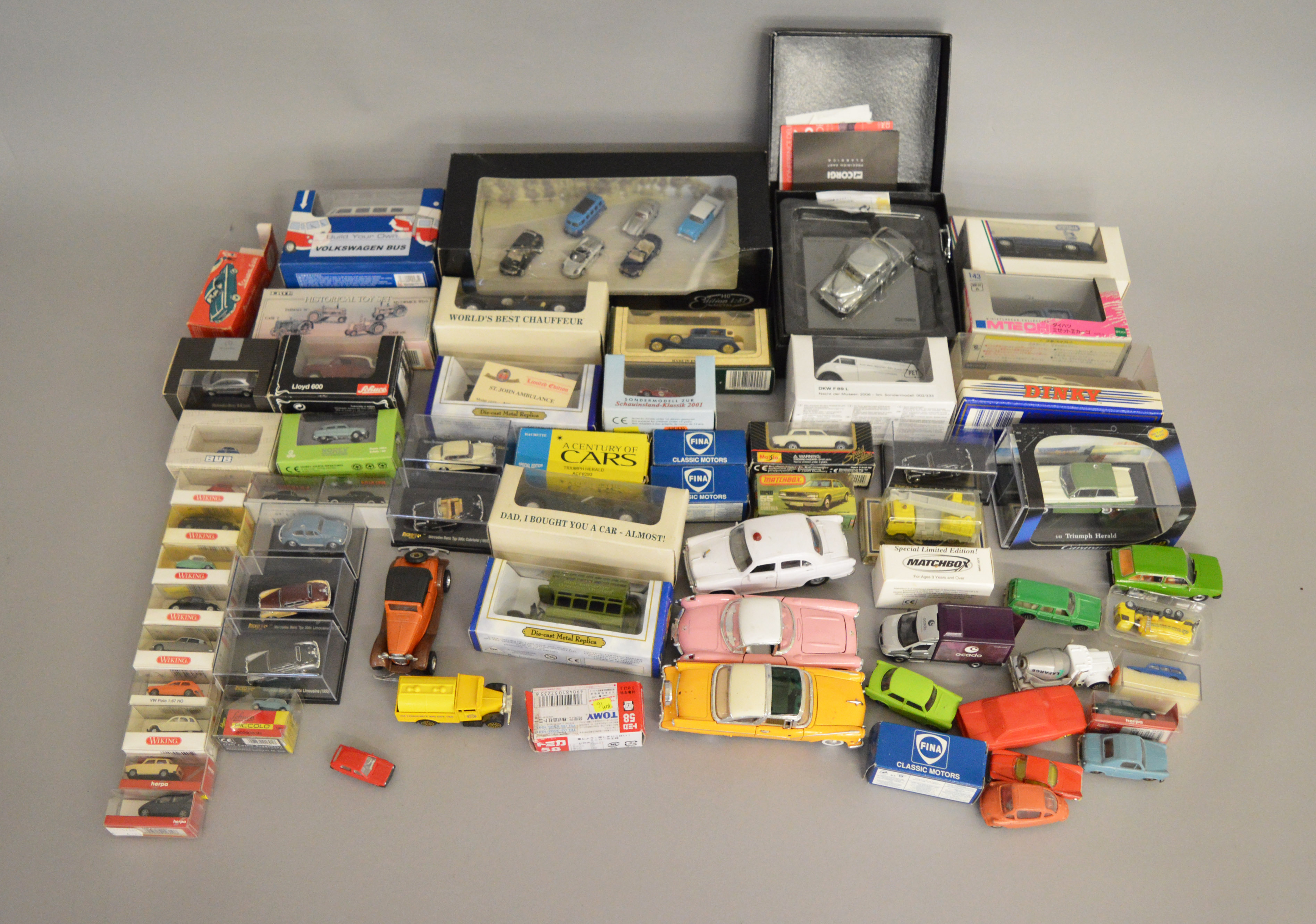 A quantity of boxed diecast and plastic models in a variety of different scales by Corgi, Schuco,