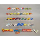 41 unboxed vintage Husky and Corgi Juniors miniature diecast model vehicles including Reliant TW9,