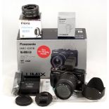 Black Panasonic Lumix GX1 Digital Camera Kit.