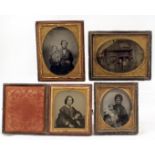 Three Ambrotypes Including a Rare Image of Farm Workers. Some dirt/marks on inside of glass.