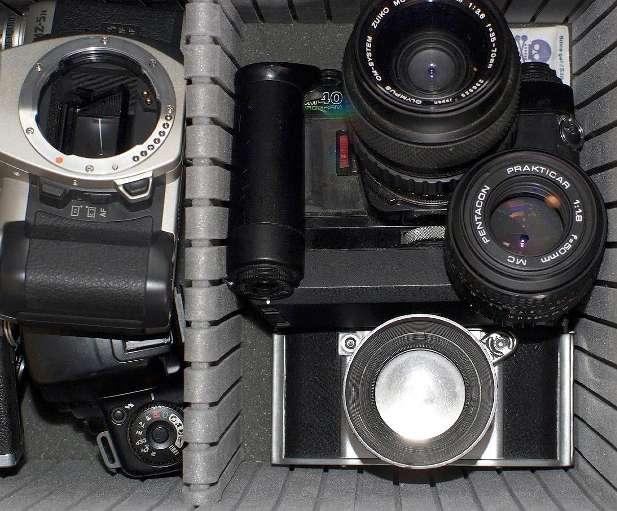 Large Selection of Film Cameras, Lenses & Accessories.