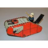 A scarce vintage unboxed German tinplate clockwork Tank model, approximately 24cm long, with fixed
