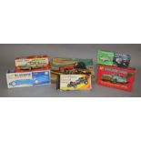 5 boxed vintage car models including a Marx plastic remote control M1 Police Car, a tinplate