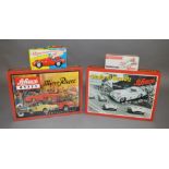 Four boxed Schuco reproduction models, 'Examico 4001' in black, #1070 Grand Prix Racer, #01644