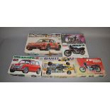 A mixed lot of car and motorcycle kits, which includes; Kawasaki 500 Mach III by Revell, Porsche